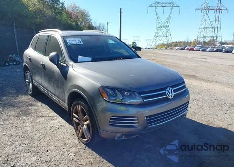 2012 Volkswagen Touareg Vr6 Executive z USA, uszkodzony, nr VIN WVGFF9BP3CD002132